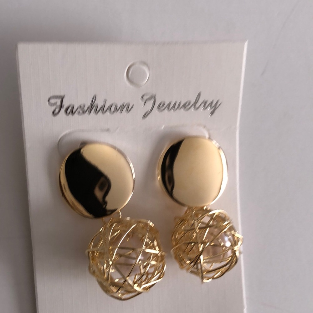 Gold tone earrings ball with pear inside